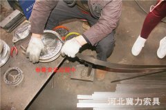 防墜器卷簧的作用及原理
